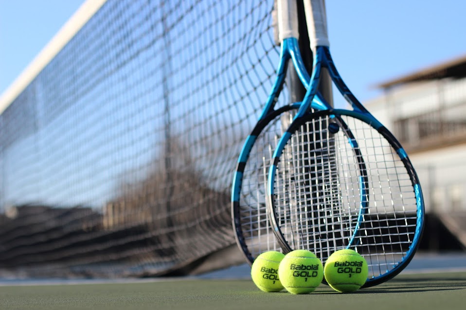 tennis net with rackets and balls tennis net with rackets and balls at corpus christi athletic club